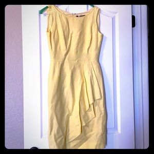 Yellow linen dress with pleated details